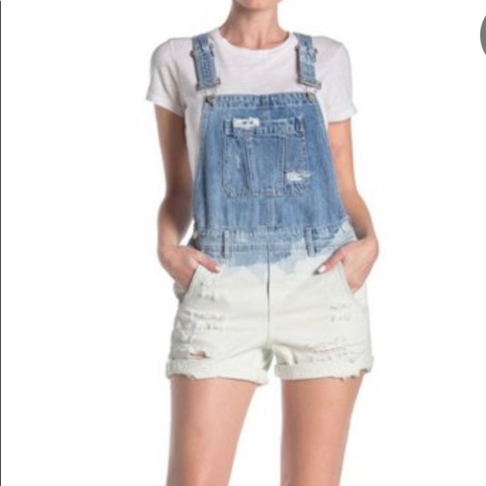 BlankNYC blue bleached denim cover-all shorts.